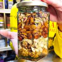 معجون لوکس هفت مغز چرخ شده با عسل یک کیلویی