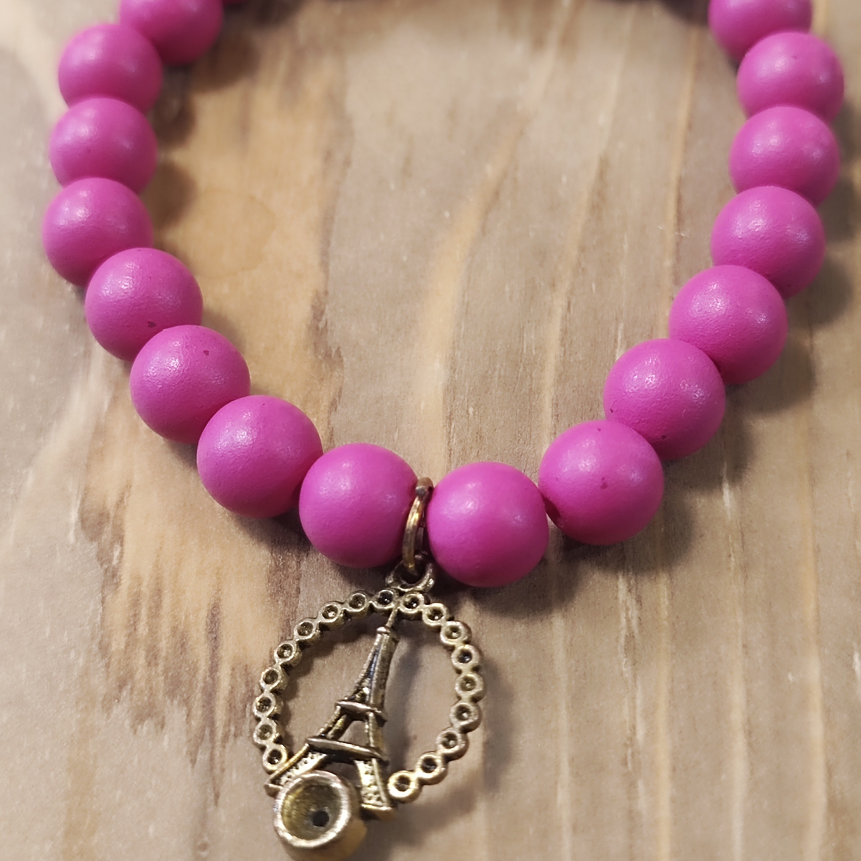 دستبند مهره صورتی