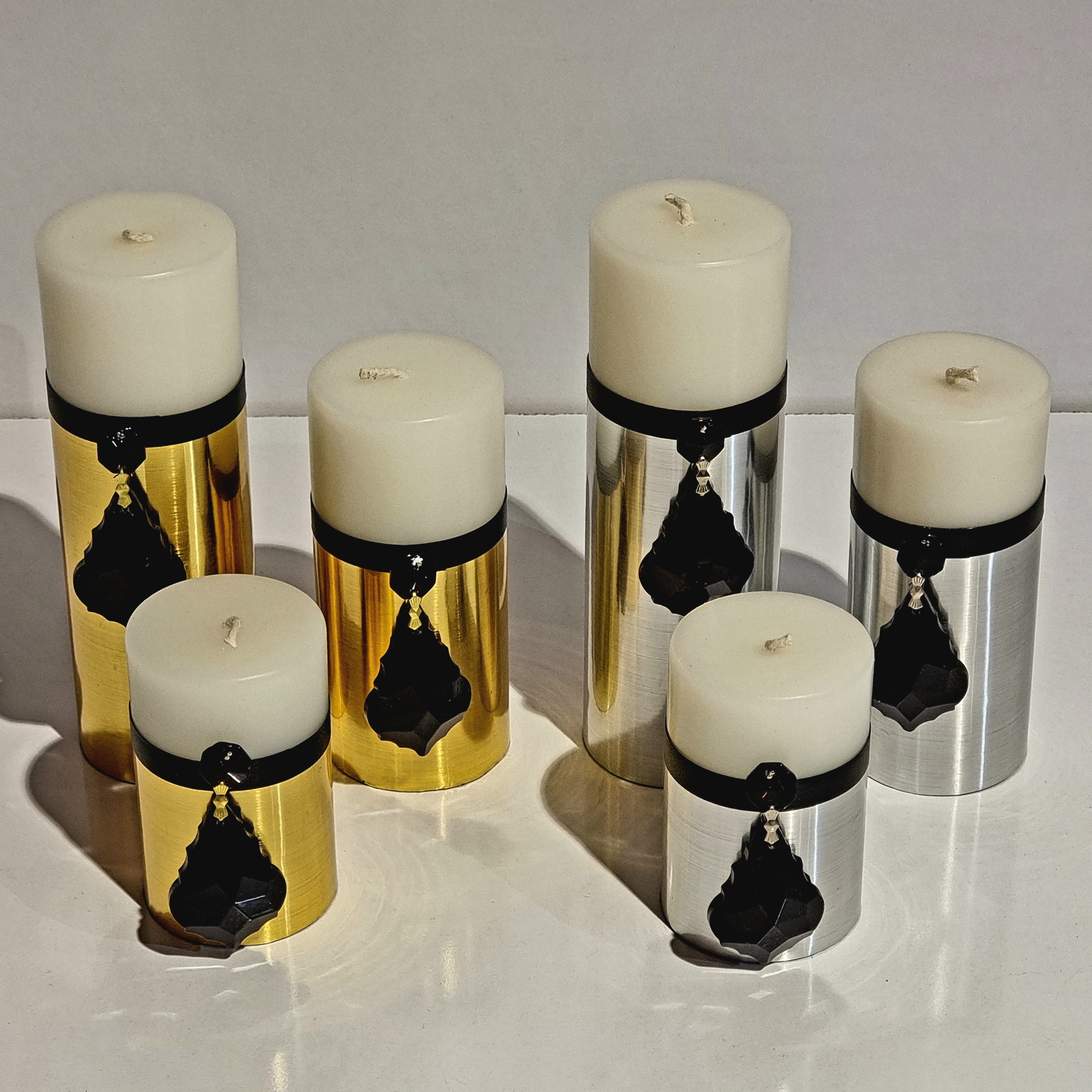 ست شمع 3 سایز در دو رنگ طلایی و نقره ای 