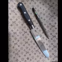 چاقو آشپزخانه چند کاربرده وارای دو سری و درب بازکن نوشابه در پلاسکو دهقان 