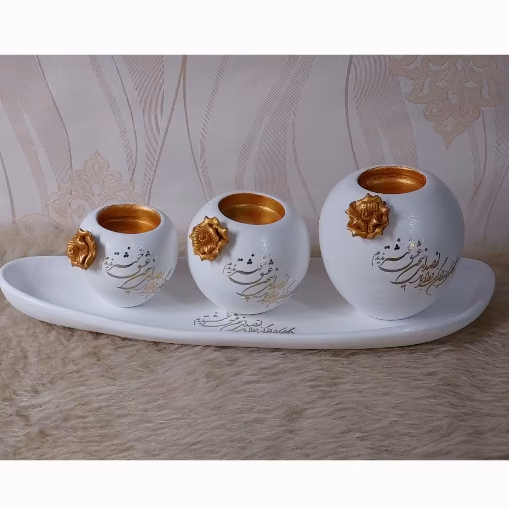 شمعدان های سفالی سه تایی همراه با کفی