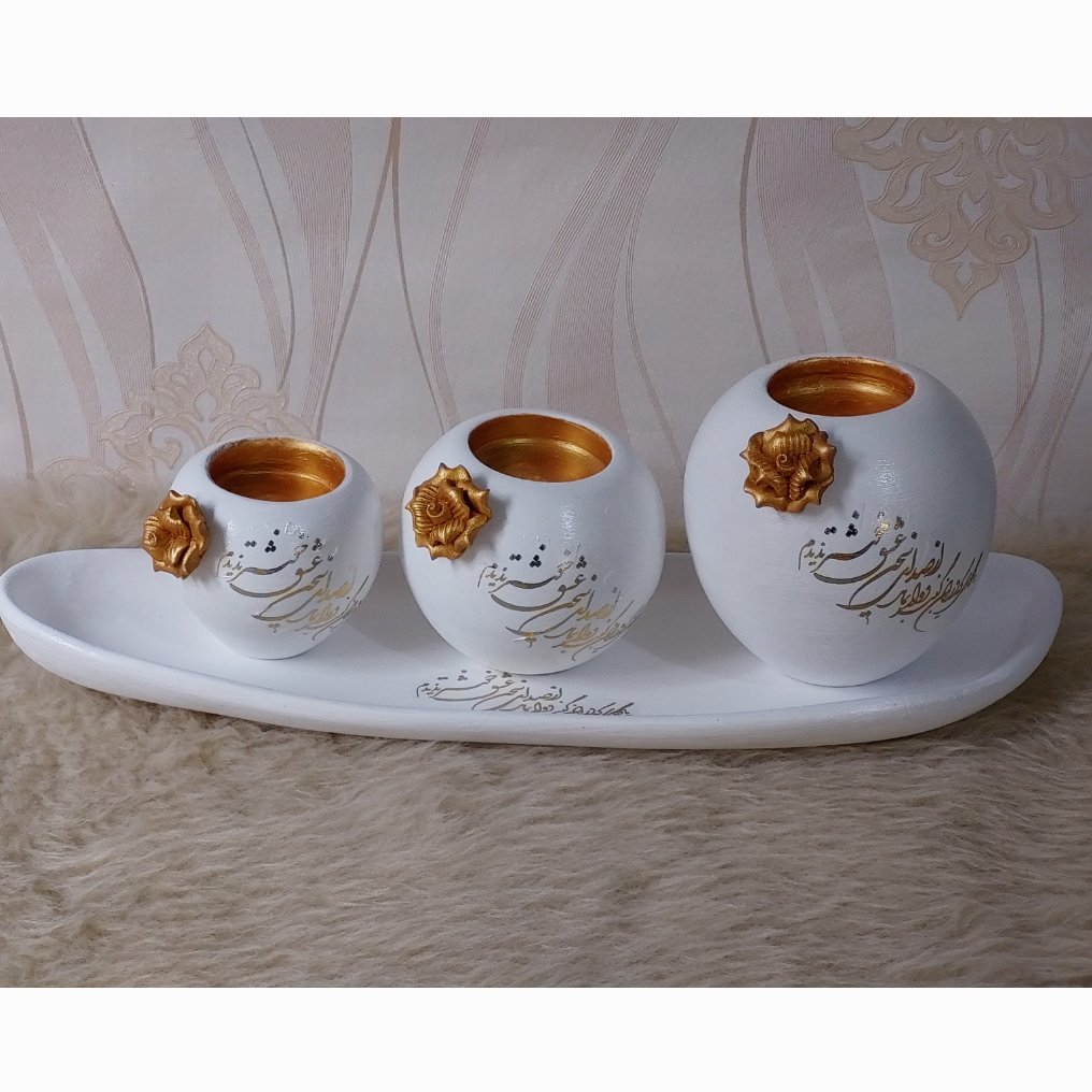 شمعدان های سفالی سه تایی همراه با کفی