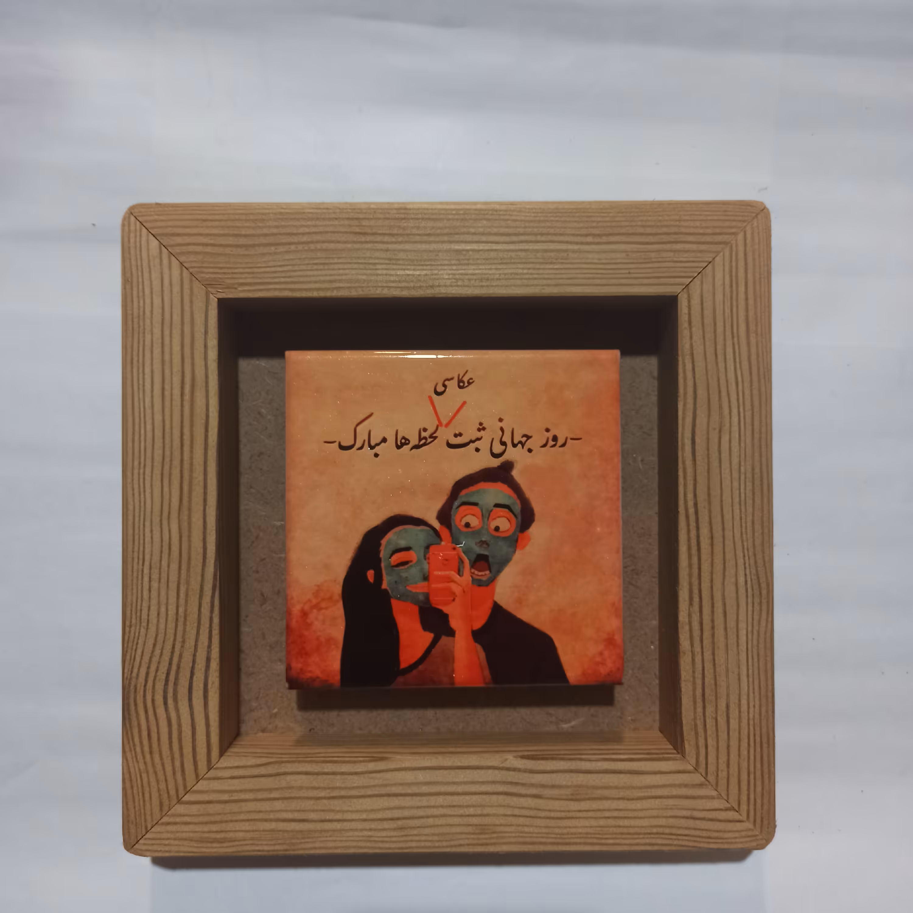 تابلو کاشی عکاس 