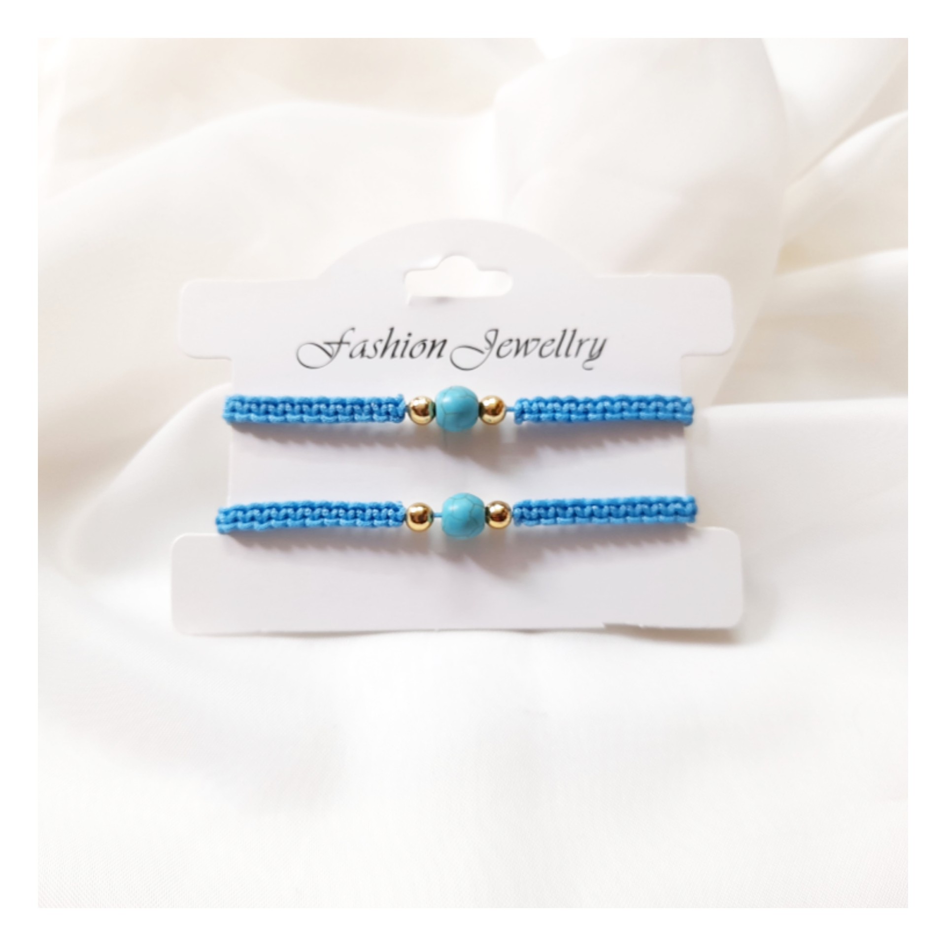 دستبند بافت فیروزه ای ابی