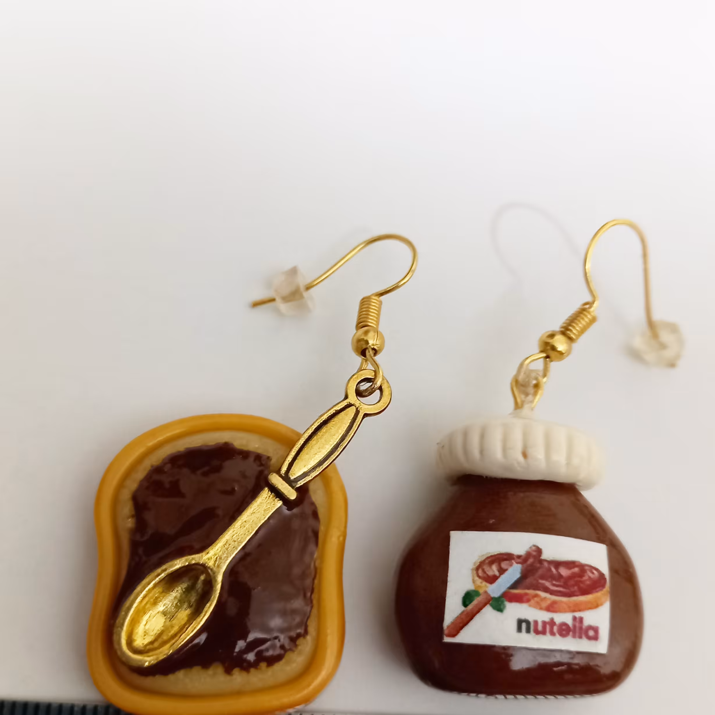 گوشواره طرح نوتلا و نون ،جنس خمیر ایتالیایی، کیلرخورده 