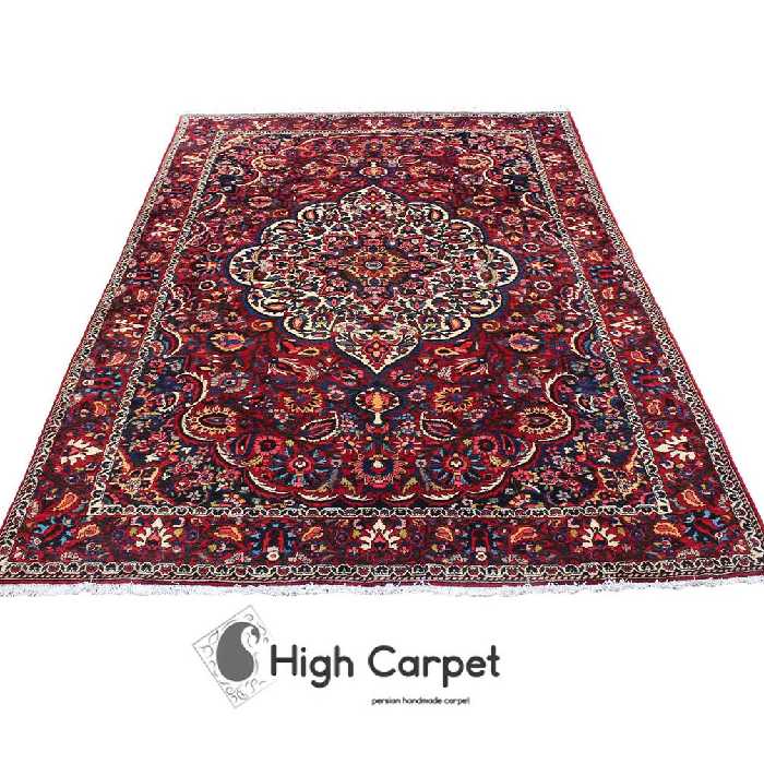 فرش دستبافت بختیار عشایر بافت زمینه قرمز لاکی شش متری  کد 0020