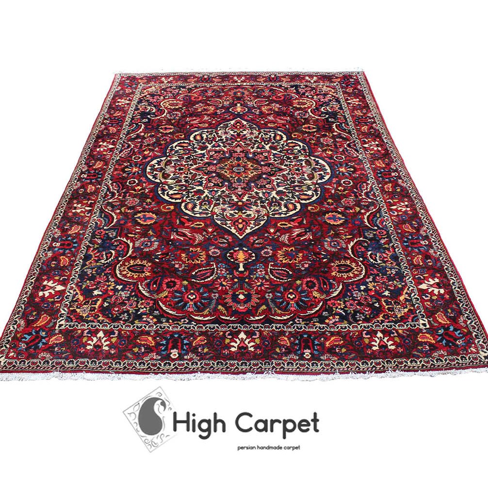 فرش دستبافت بختیار عشایر بافت زمینه قرمز لاکی شش متری  کد 0020