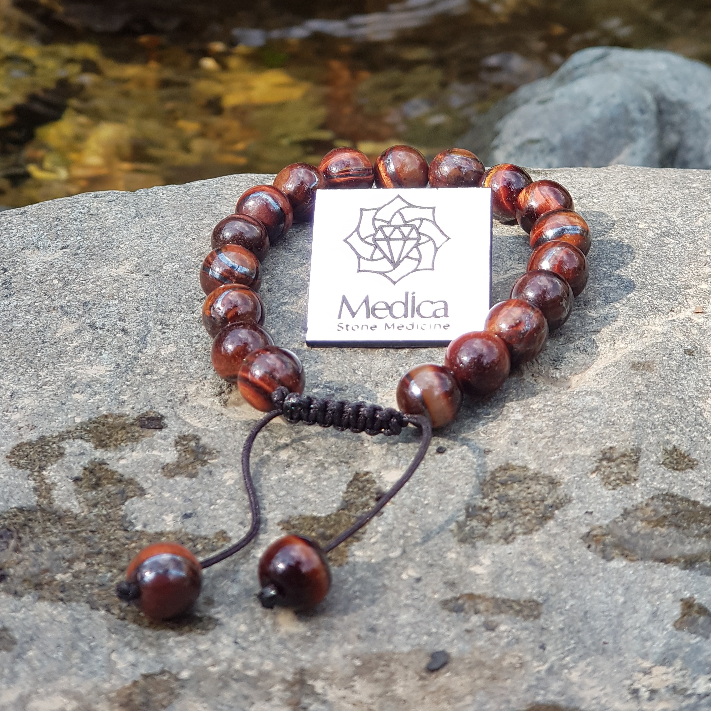 دستبند سنگ  چشم ببر قرمز  طبیعی
سایز 8 دور مچ 17
کد 119