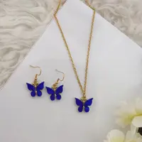 گردنبند و گوشواره پروانه ای آبی