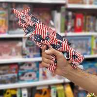 اسباب بازی تفنگ تیر باری باطری شارژی تیر ژله ای وارداتی ابعاد 34در14سانت 