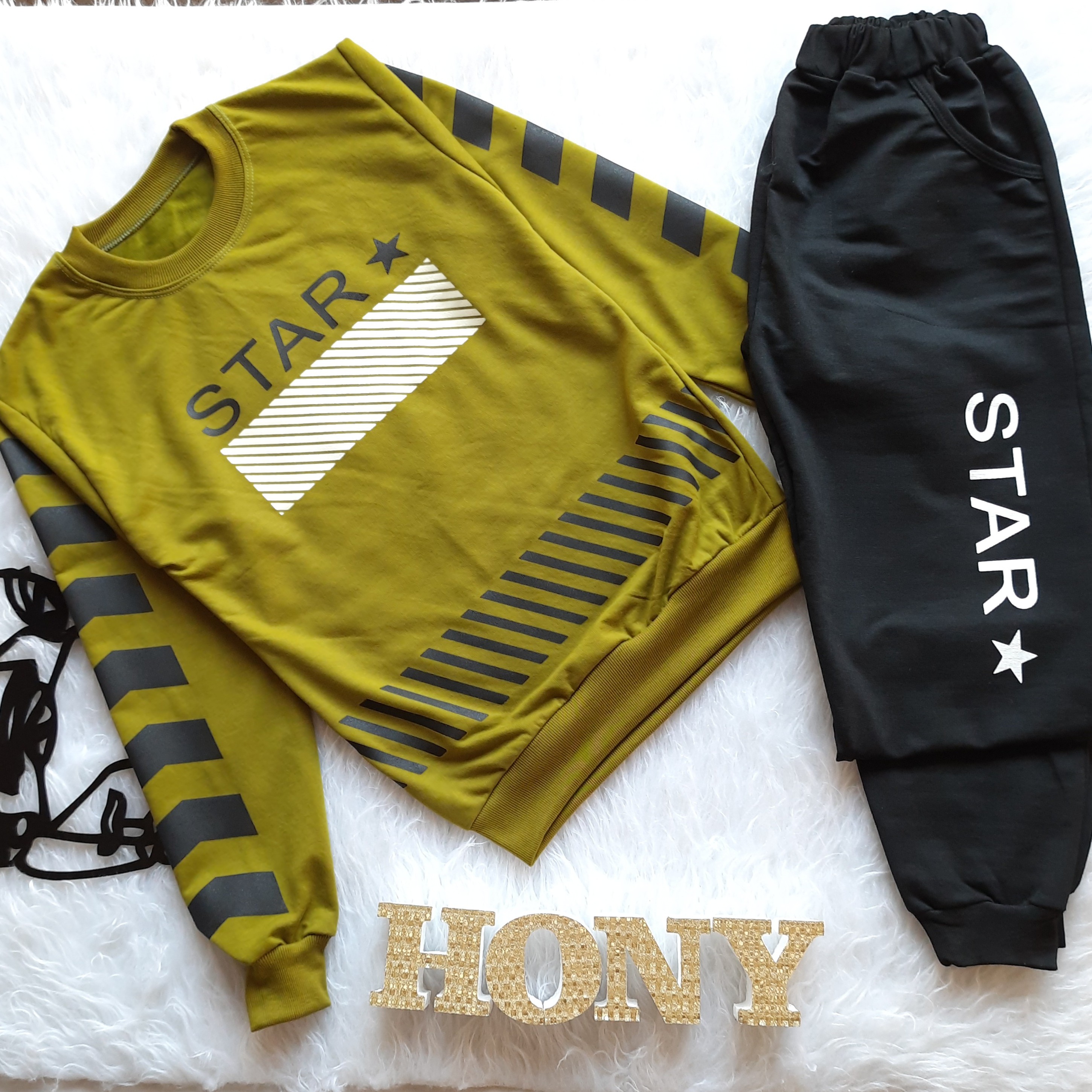 لباس راحتی و خانگی پسرانه ست دو تکه بلوز شلوار سایز 60 و 65پسرانه جنس فلامنت اعلا دارای کشسانی بالا 