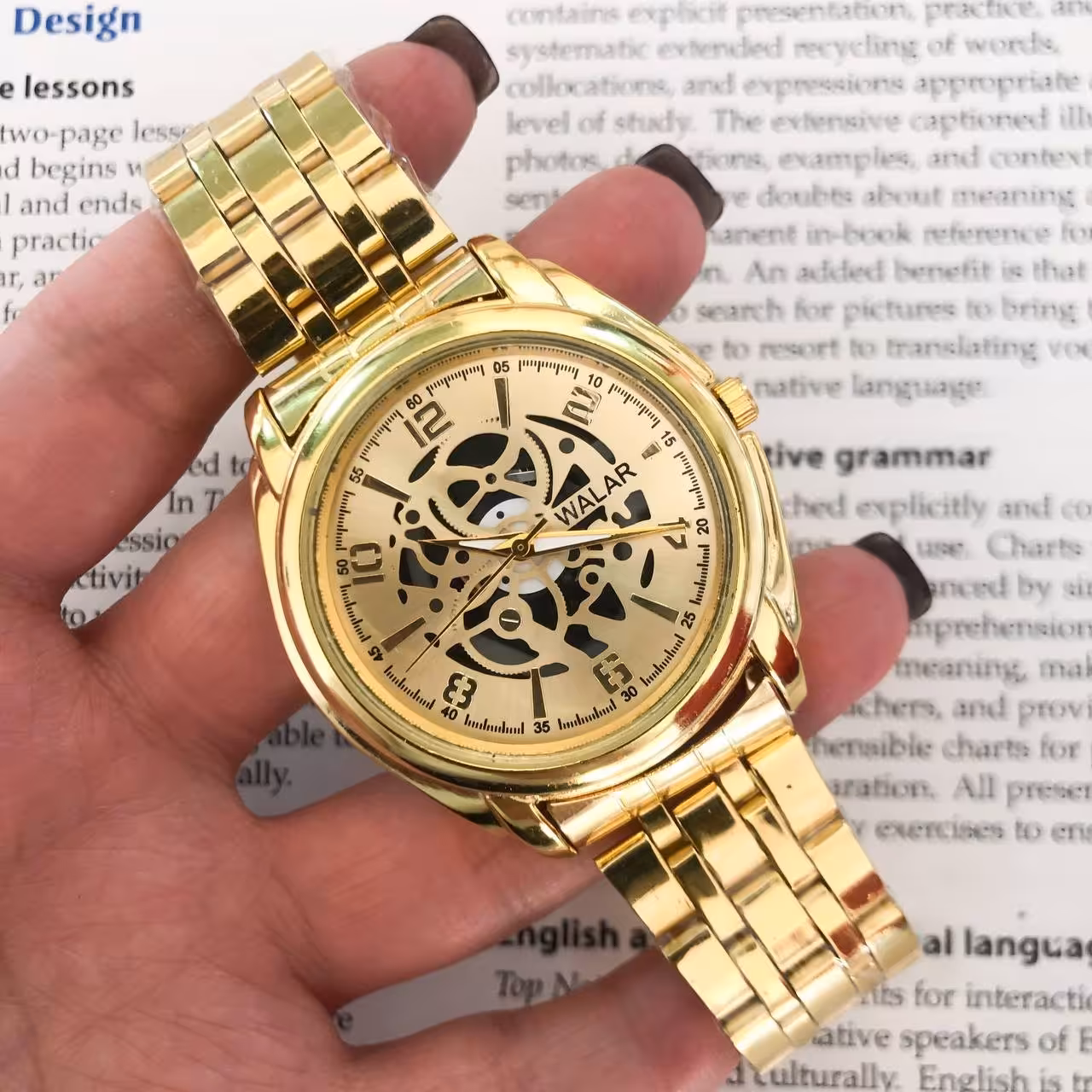 ساعت مچی مردانه والار طرح اتومات بنداستیل طلایی
وارداتی از دبی
کیفیت عالی
قفل فشاری 
شش ماه گارانتی موتور
