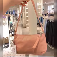 کیف پارچه ای برند استرادیواریوس رنگ صورتی کمرنگ 