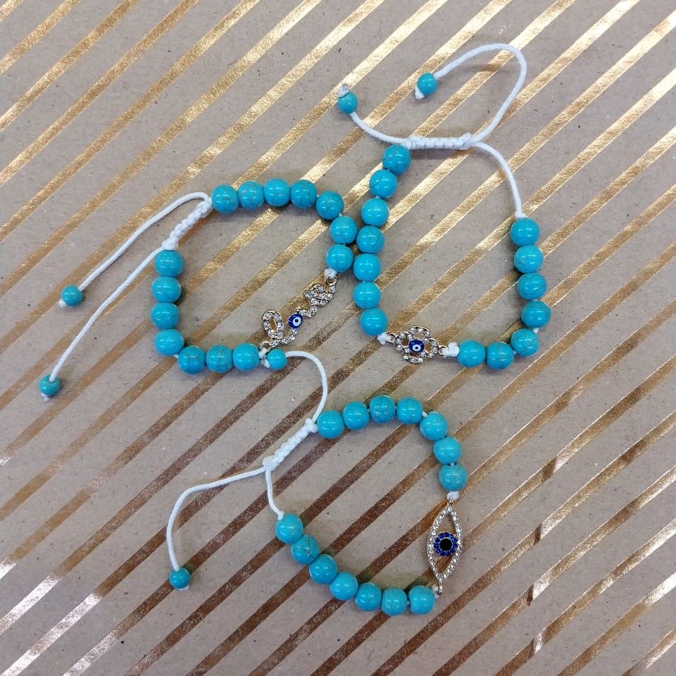 دست بند مرواریدی رنگ آبی در های طرح چشم زخم