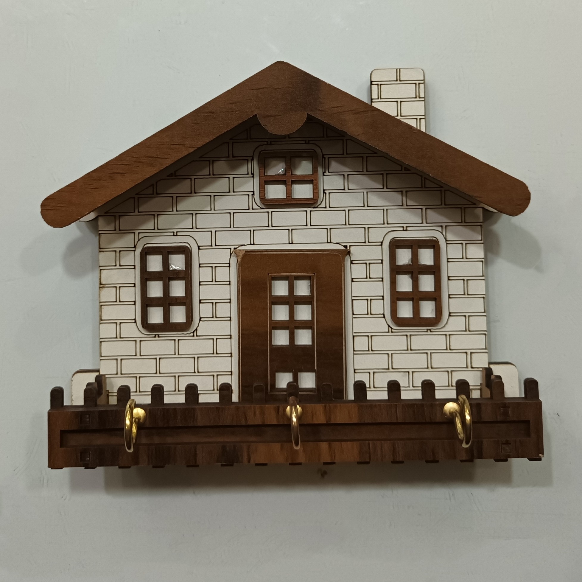 جاکلیدی طرح کلبه چوبی کوچک 