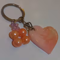 جاکلیدی رزین نشکن طرح قلب  یه همراه آویز           