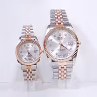 ساعت رولکس ست زنانه و مردانه تقویم دار رنگ ثابت استیل ضدآب ارسال رایگان همراه با جعبه رایگان .