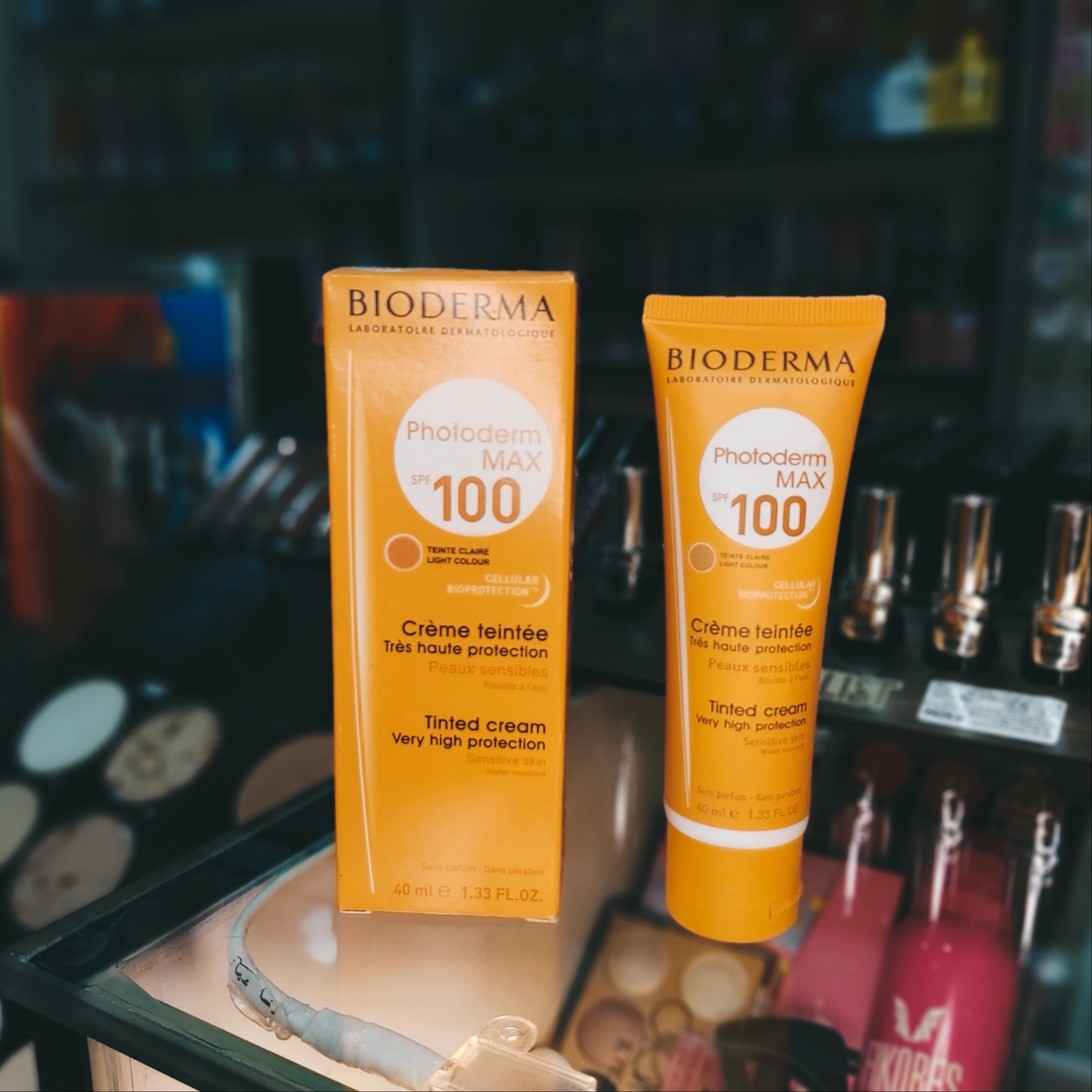 ضدآفتاب بیو درما spf100 کرم پودردار رنگ متوسط 