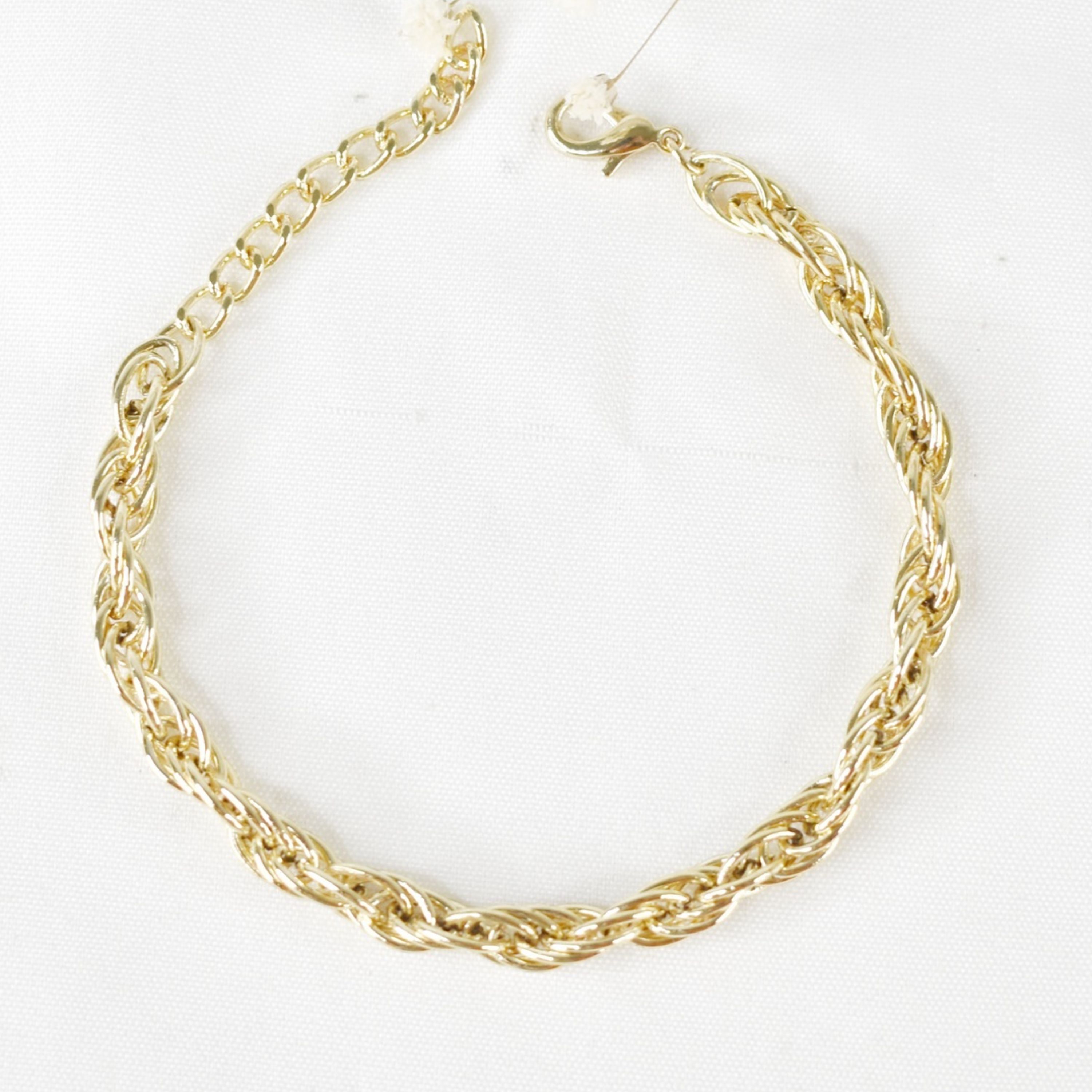 دستبند طرح طلا پیچ دار کد 7069