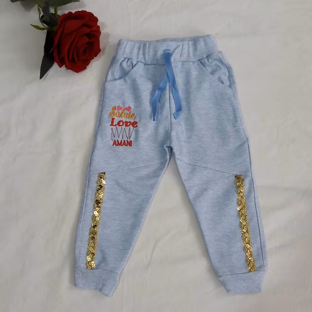 شلوار دخترانه نوار پولکی دورس رنگ آبی سایز 50،شلوار دخترونه قد 47سانت دورس لاکرا