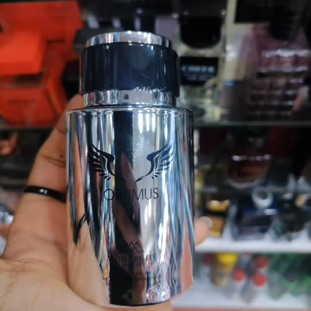 عطر ادکلن ادو پرفیوم موناریچی مدل اپتیموس Optimus حجم 100 میلی لیتر  MONARCHY Optimus EDP ML 100