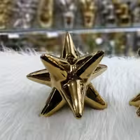 جا شمعی ستاره 8 پَر بزرگ طلایی آبکاری فورتیک جنس سرامیک