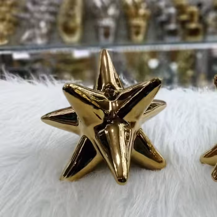 جا شمعی ستاره 8 پَر بزرگ طلایی آبکاری فورتیک جنس سرامیک