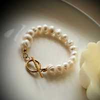 دستبند مروارید پرورشی باقفل تی -ارسال رایگان مهرک