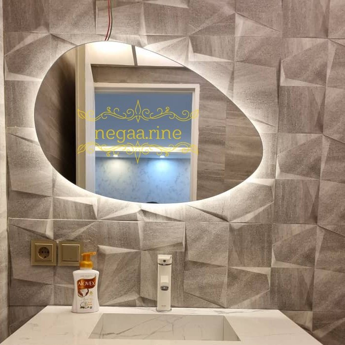 آینه دیواری دفرمه بک لایت تخم مرغی ابعاد 75/51