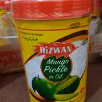 ترشی انبه پاکستانی خالص روغنی برند  رضوان در وزن 1 کیلویی  درجه یک