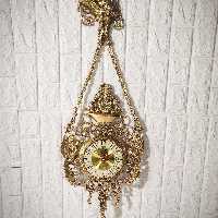 ساعت دیواری طاووس برنزی قطر صفحه 14نیم ارتفاع 88عرض 31سانت