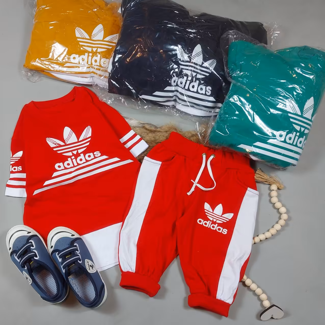  ست تیشرت شلوارک ادیداس پایین  تیکه خور 4 رنگ سایز  45تا60  نخ پنبه درجه یک