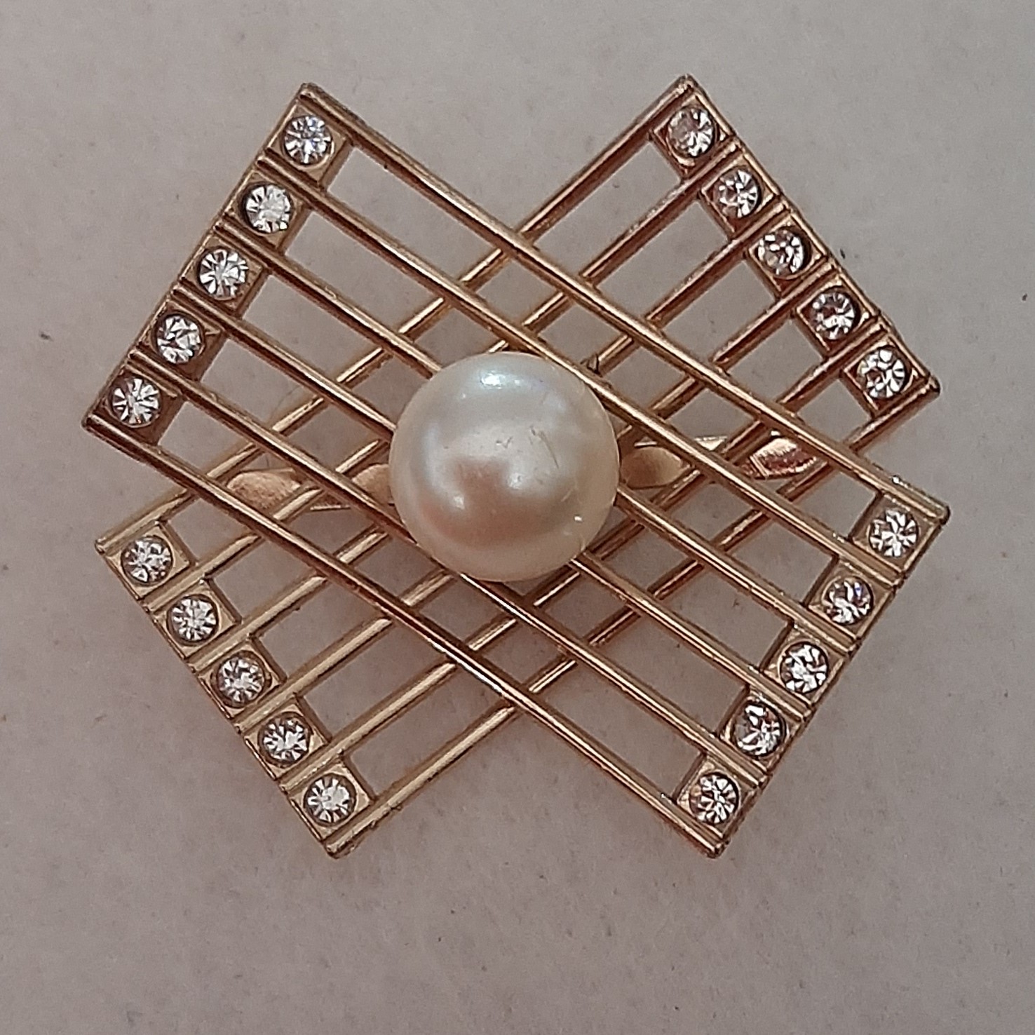 مارک فلزی کیف . نگین دار . طلایی. مروارید دار. 5 سانتی