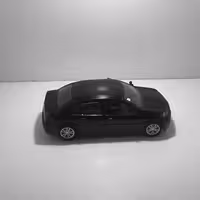 ماکت ماشین فلزی رنو مگان رنگ مشکی به طول 11 و نیم سانتیمتر و وزن 105 گرم