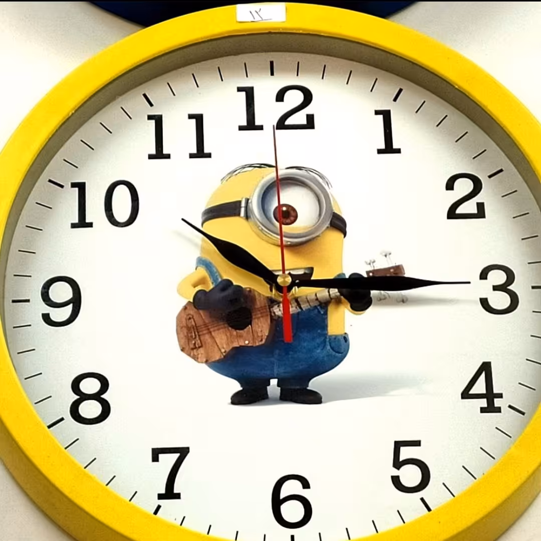 ساعت دیواری دیزنی کد23628طرح مینیون