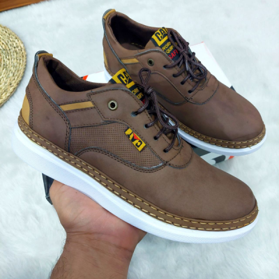 کفش مردانه یک سایز بزرگ روزمره CAT رنگ زیتونی