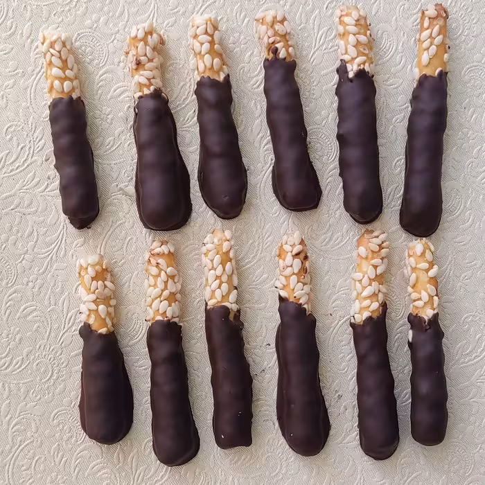 چوبشور کنجد شکلاتی (شکلات تلخ شیری سفید)(چوبشور کنجدی)(بسته بندی شیشه ای)