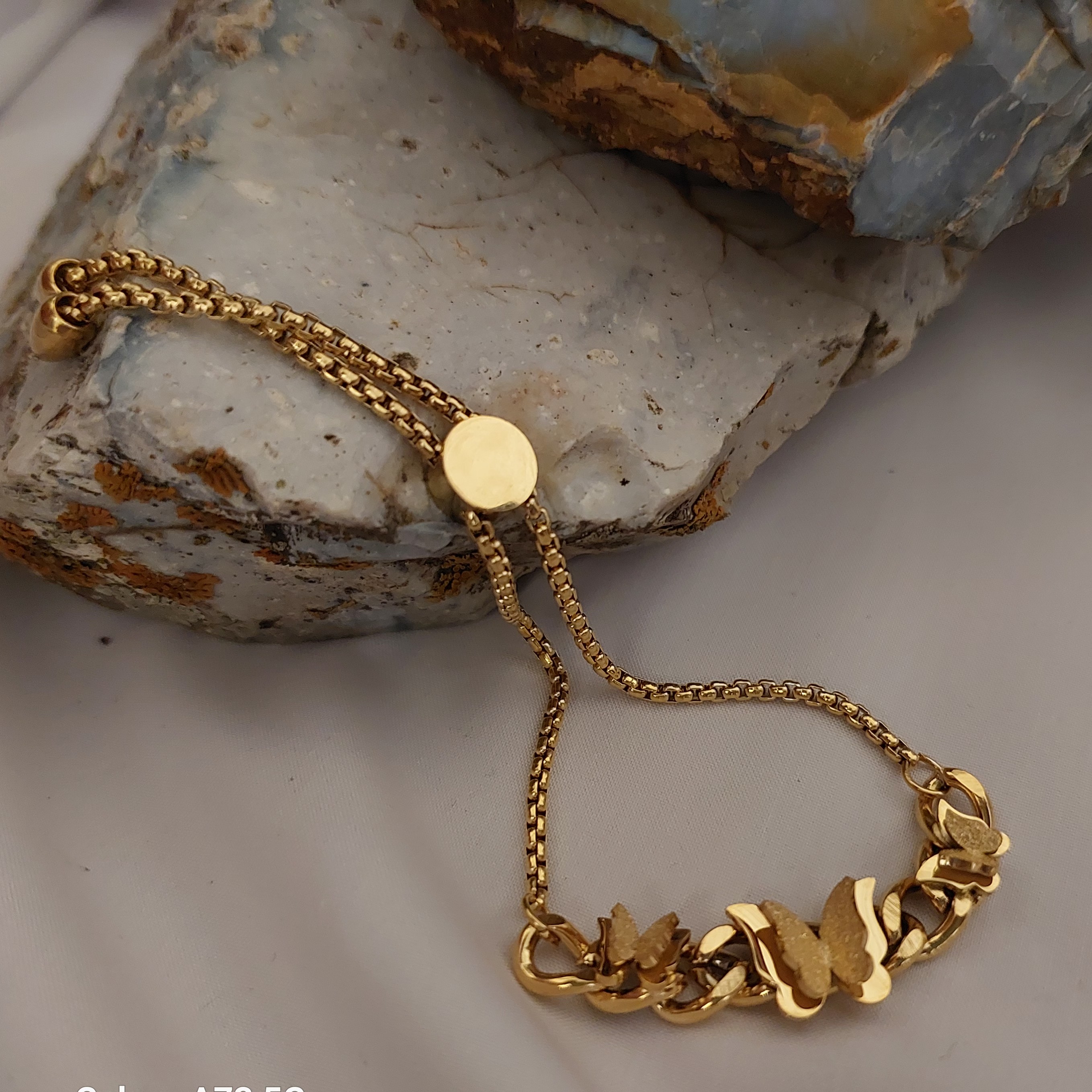 دستبند کارتیر  پروانه طلایی رنگ ثابت 