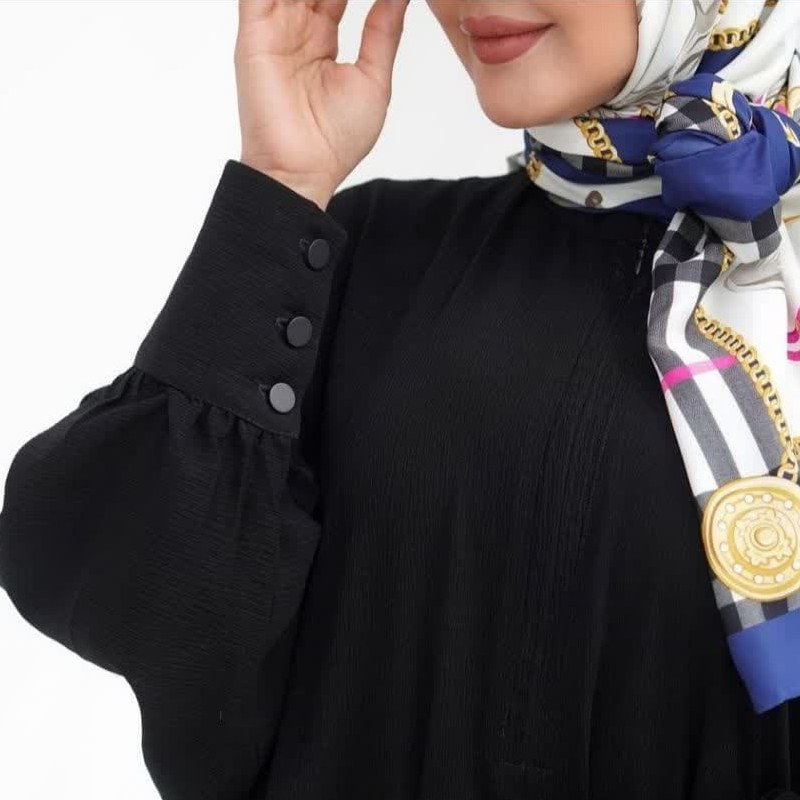 مانتوعبا کریشه سبز پاستیلی قد 140 دارای زیپ مخفی بند تنظیم مچ آستین دکمه دار است