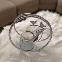 شمعدان مدل گرد پرنده نقره ای             