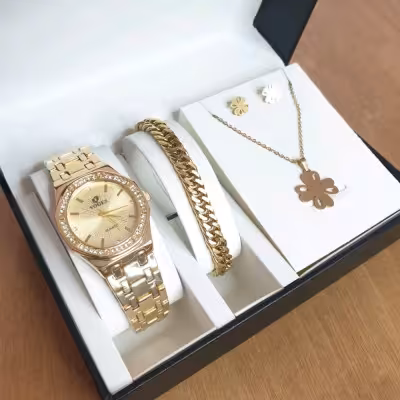 ساعت زنانه مجلسی طلایی نگین دار همراه با نیم ست و دستبند