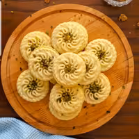 کلمپه اصیل کرمان با بهترین مغز  گردو و خرمای اعلی نیم کیلوئی