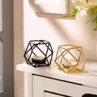 جا شمعی فلزی در رنگ های  طلایی مشکی ونقره ای دکوراتیو و تزیینی 