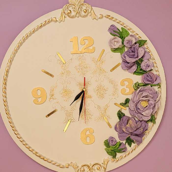 ساعت دیواری گل برجسته با استاکو و قطر 50 سانت با موتور ارام گرد