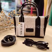 
کیف حصیری زنانه M. A. N. G. O
