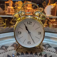 ساعت رومیزی (زنگ دار) طرح برنجی (طلایی) 