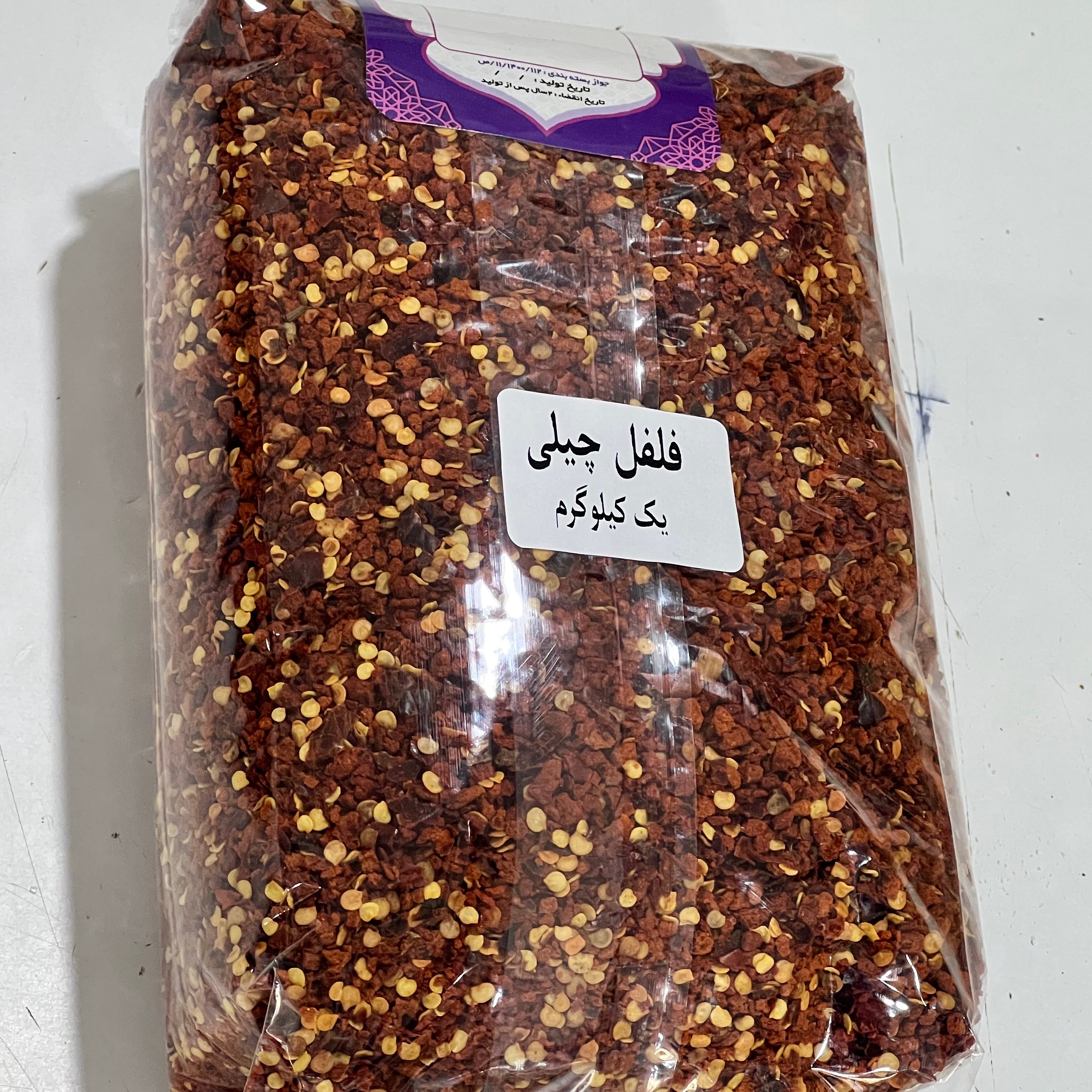 فلفل چیلی پرک تند 100 گرم (فلفل پیتزایی) - عمده فروشی کیامد - ارسال رایگان