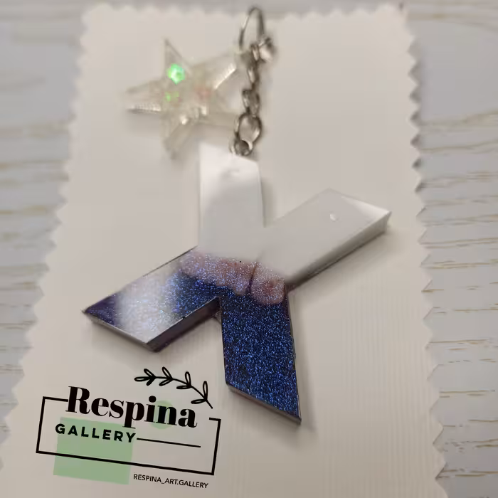 جاسوئیچی حرف  x  رزینی به همراه آویز  ستاره