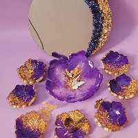 هفت سین رزینی و اینه به همراه کاسه تخم مرغ و جاشمعی