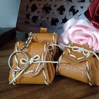 جاکلیدی چرم طرح کوله پشتی